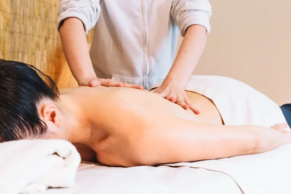Relaxing Swedish massage with smooth strokes and comfort