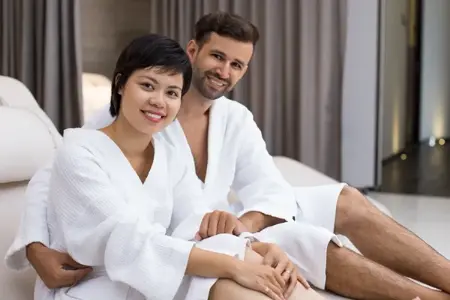 Professional couple massage service at home in Vasant Kunj, Delhi with two experienced massage therapists.