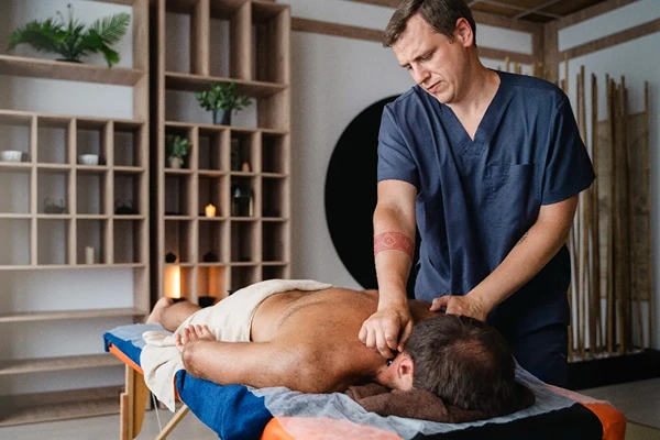 Male therapist providing a professional male to male full body massage at home or hotel in Shimla.