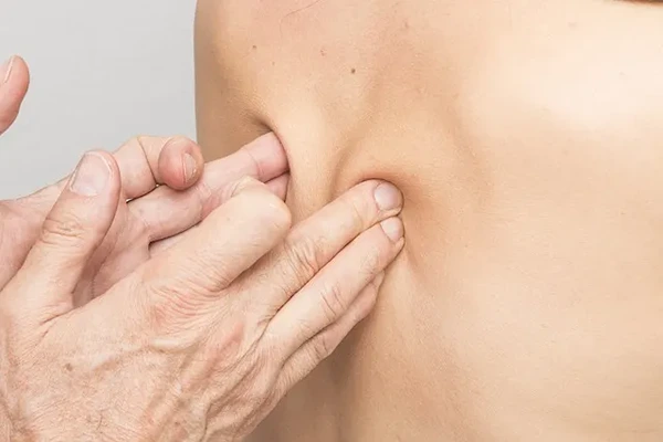 Professional male therapist holding consultation before male to male full body massage session in Noida