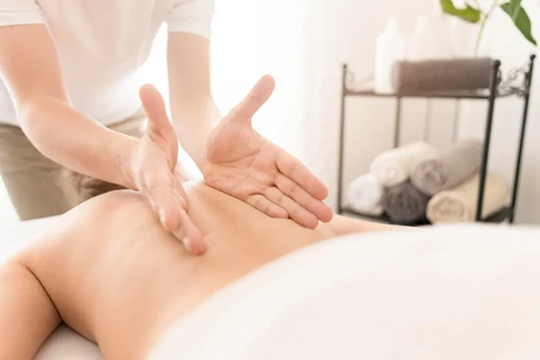 Professional male to male massage therapist providing a relaxing home or hotel wellness session in North Delhi.