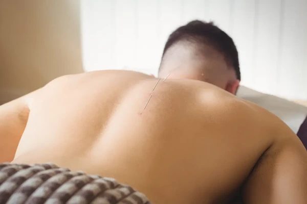 Experienced male massage therapist providing personalized home massage therapy in Punjabi Bagh, Delhi for relaxation, flexibility, and everyday wellness.