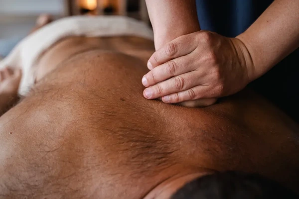 Professional male massage therapist providing a relaxing male-to-male home massage service in Central Delhi.